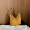Bolsa tecida elegante de grande capacidade para mulheres, novo modelo da primavera de 2026, bolsa de ombro crossbody simples para o dia a dia, bolsa estilosa de axila