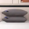 Un par de almohadas lavables de terciopelo de plumas para uso doméstico, almohada para adultos con soporte para el cuello de hotel cinco estrellas