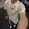 Nova camiseta bordada de manga curta estilo americano para rua, para homens e mulheres, corte solto, algodão puro de peso pesado, marca da moda, mesmo estilo para casais