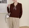 Suéter de punto con cuello de bufanda de seda de color liso transfronterizo para mujer, nuevo estilo Primavera y Otoño 2026, cárdigan de punto pullover rejuvenecedor, estilo coreano