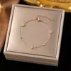 Pulsera de Acero de Titanio de Alta Calidad que no se decolora Lujo Ligero Versátil Estilo Ins Chapada en Oro de 18K Joyería de Mano Exquisita de Gama Alta