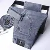 Jeans Elásticos de Verano Ajustados Versátiles de Pierna Recta 2026 Nuevos de Verano Finos de Moda para Hombre Pantalones Largos Casuales para Hombre