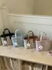 Bolsas Femininas de Luxo Transfronteiriças 2026 Nova Moda Tendência Primavera/Verão Exquisite Ultra-Popular Bolsa de Ombro Transversal Estilo Balde
