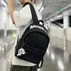 Nova Mochila Escolar Ensino Fundamental Médio Faculdade Bolsa de Ombro Dupla Mochila Casual de Grande Capacidade Transfronteiriça Duplo Ombro Feminina de Alto Padrão Nicho