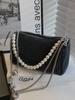Bolso tipo almohada de alta gama con incrustaciones de diamantes para mujer 2026 Moda de nicho Bolso de hombro elegante Estilo coreano Bolso casual versátil para mujer