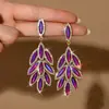 Pendientes de Pluma de Pájaro de Lujo Transfronterizos Borla Cristal Pluma Pendientes de Mujer Pendientes Combinación Vestido Pendientes de Banquete Venta al por Mayor