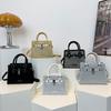 Bolso de moda de diseño de nicho para mujer, otoño 2024, nuevo bolso cuadrado pequeño portátil, bolso cruzado de un solo hombro de moda para mujer