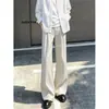 Pantalones casuales de otoño de color liso con un estilo cool retro americano de alta costura, versátiles, adelgazantes, que alargan las piernas, ligeramente acampanados para hombre