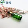 Botella de Vidrio Verde a Prueba de Luz Jingtuo de Guangzhou con Gotero de Punta de Goma 10ml Botella Dispensadora de Líquido Esencial Venta al por Mayor Personalizada