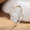 Anel de Flor de Primavera Estilo Chinês Novo Banhado a Prata, Design de Nicho Doce e Inspirado na Floresta, Anel Aberto Exquisito de Luxo de Alta Qualidade