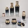 Botella Crown nuevo set de botellas pequeñas negras botella 100ml botella de loción 30ml botella de esencia botella dividida en degradado negro