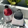Mochila Nueva a Cuadros 2023 Bolso de Dama Estilo Japonés-Coreano Mochila Escolar para Estudiantes de Comercio Exterior Mochila Grande de Capacidad para Exteriores