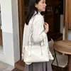 Bolso de mano casual simple estilo coreano para mujer 2026 nueva moda para ir al trabajo color liso almohada bandolera