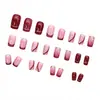 Uñas postizas de alta calidad en degradado rojo vino rosa nude con borde dorado líneas finas doradas exquisitas manicuras francesas retro suave