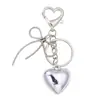 Llavero de Lazo de Corazón Simple Versátil Colgante de Llavero de Corazón de Metal Adorno para Llave de Coche Mochila