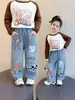 Ropa de Otoño para Niñas Jeans 2026 Nuevo Estilo Niñas Pequeñas Primavera y Otoño Dibujos Animados Suave Ropa Casual Pantalones Rectos para Bebés Niñas