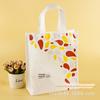 Bolsa de presente publicitária atacado de fábrica bolsa de compras revestida nova bolsa dobrável de TNT transferência térmica