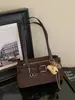 Bolso de hombro retro de diseño de nicho transfronterizo para mujer, nuevo modelo Otoño 2026, bolso de hombro de moda estilo coreano para commuting con textura