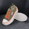 2026 Nueva Versión Coreana Color Sólido Casual Color Caramelo Zapatos de Lona de Caña Baja para Mujer Zapatillas Planas Ligeras Zapatillas de Running de Moda