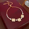 Pulsera Flor de Circonita Chapada en Oro Real Nicho Dulce Versátil Pulsera Temperamento Lujo Ligero Joyería de Gama Alta para Mujeres Al Por Mayor