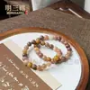 Promocional de Transmisión en Vivo Pulsera de Peluche Flor de Durazno Rosa Fabricante Venta al por Mayor Natural Seda Dorada Jade Flor de Durazno Relleno Pulsera de Cuentas Redondas