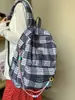 Nova Mochila Xadrez Versátil da Moda Ultraleve Casual para Estudantes do Ensino Fundamental e Médio Mochila de Grande Capacidade Atacado