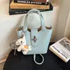 Bolsa de Mão Simples com Padrão de Lichia Estilo Coreano para Mulheres 2026 Nova Moda High-End Versátil Bolsa Transversal de Balde