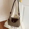 Bolso Pequeño Tejido Vintage para Mujer 2026 Nuevo Bolso Sencillo Tejido Tipo Dumpling Bolso Cruzado de Hombro Elegante de Verano para Viajar