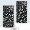 Funda de teléfono impresa pintada al por mayor no en blanco y negro pequeña floral de cristal adecuada para Samsung S25/S26 Ultra