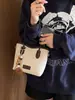 Bolsa tote transfronteiriça, de alta qualidade, fashion e de grande capacidade para mulheres, nova coleção de outono 2026, bolsa de ombro retrô e minimalista, bolsa transversal moderna