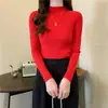 Suéter de punto de manga larga ajustado con cuello medio alto fino de primavera y otoño, suéter interior corto ajustado de otoño e invierno, camisa de fondo para mujer