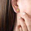 Pendientes de acero de titanio populares con temperamento de sensación de metal europeo y americano, joyería con personalidad, patrón de estrella y luna, joyería redonda que no se decolora