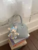 Bolso de Concha Casual Simple de Nicho Nuevo Estilo Primavera/Verano 2026 Bolso de Hombro para Mujer con Diseño Único Bolso Cruzado de Moda