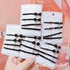 Yiwu Puesto Callejero Papelería Tienda Accesorios para el Cabello Tienda de 2 Yuan Venta al por Mayor Popular Femenino Simple Pasador Negro Pasador B15