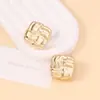 Pendientes Retro Europeos y Americanos de Alta Gama con Diseño de Nudo Tian Zi Estilo Sencillo de Nicho Versátil