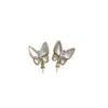 Joyería hecha a mano DIY aretes de perlas, soportes de aretes vacíos, accesorios, aretes clásicos de mariposa de nácar natural, suministro al por mayor