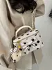 2026 Nova Bolsa de Mão com Corrente Estilo Pequeno Perfume Bolinhas Bolsa de Ombro Único Estilo INS Moda Simples Elegante Bolsa Saco Feminina