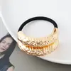 Estilo punk europeo y americano metal personalidad alta calidad cuerda para la cabeza semicírculo tubo redondo anillo para el pelo cuerda elástica para el pelo Balot fabricantes al por mayor