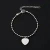 Moda Europea y Americana Simple Metal Corazón Acero Inoxidable Material en Blanco Láser Color Impreso Acero Inoxidable Cadena de Bolas Pulsera