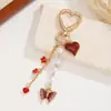 Llavero de Corazón para Mujer Más Vendido Transfronterizo Corazón de Cereza con Perla Colgante de Moda Accesorio para Llavero de Bolso
