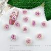 Novos acessórios de nail art flor de ponto de três cores óleo macio acessórios de nail art vaga-lume tingimento luminoso borboleta camélia atacado