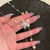 Collar de plata hueco con forma de flor y perlas estilo coreano para mujer, nuevo modelo 2026, cadena para la clavícula con un toque de alta gama, accesorio largo ajustable