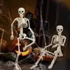 Decoración de Esqueleto de Halloween Esqueleto Artificial de 40 cm Puede Estar de Pie y Colgarse Esqueleto Accesorios de Decoración para Fiesta de Casa Embrujada
