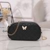 Bolsa feminina versão coreana da moda 2023 bolsa de couro Joker bolsa de cosméticos viva uma geração de textura de cabelo bolsa feminina