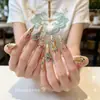 Nuevos accesorios de arte de uñas esmaltados estilo chino, con fénix de esmalte azul, borlas, perlas y diseños florales, al por mayor para decoraciones de uñas tradicionales.