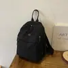 Mochila de Gran Capacidad para Mujer Nueva Ligera de Tela de Nylon Bolso de Viaje Sencillo Tendencia Femenina Versátil Bolso Casual Mochila Pequeña