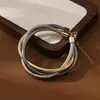 Pulsera de Collar de Resorte Enrollado de Tres Hilos Transfronteriza Europea y Americana Lujo Ligero Alto Sentido Metal Punk Hip-hop