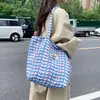 Bolso de lona nuevo estilo coreano 2026, gran capacidad, versátil, doble cara, bolso de hombro para el día a día, bolso tote para el trabajo, cesta de compras de mano