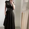 Elegante conjunto de chaleco de punto estilo francés 2023 suéter sin mangas entallado a la cintura con falda fluida conjunto de dos piezas