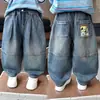 Pantalones de niño primavera jeans 2026 nuevo modelo de primavera estilo coreano para niños jeans rectos holgados pantalones largos para bebé